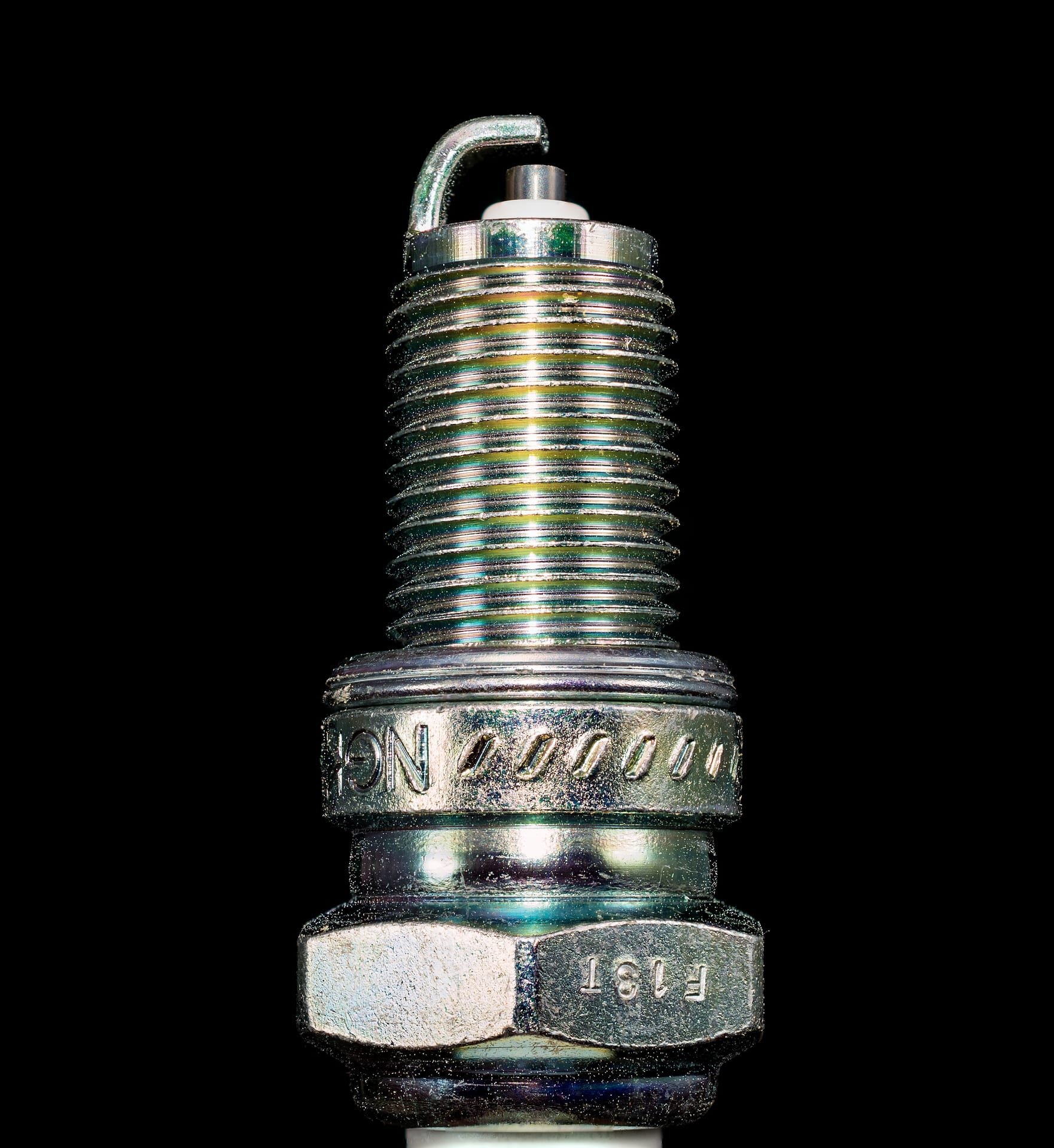 A spark flying from a screw thread